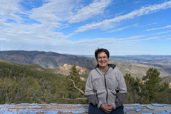 Lale standing in front of the Gila Wilderness